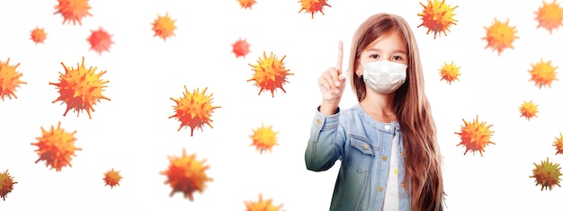 Photo young girl with protection mask against corona virus at school.