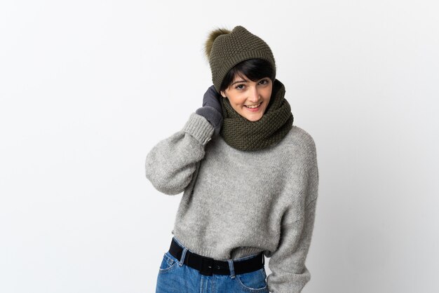 Young girl with winter hat laughing