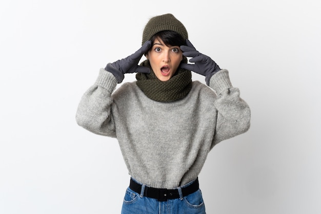 Young girl with winter hat with surprise expression