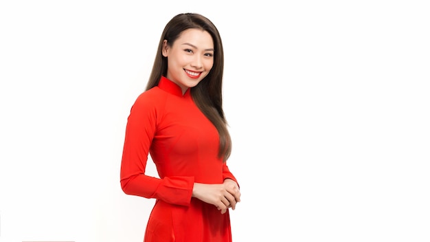 Young girls dressed in Vietnam culture traditional dress standing over white background