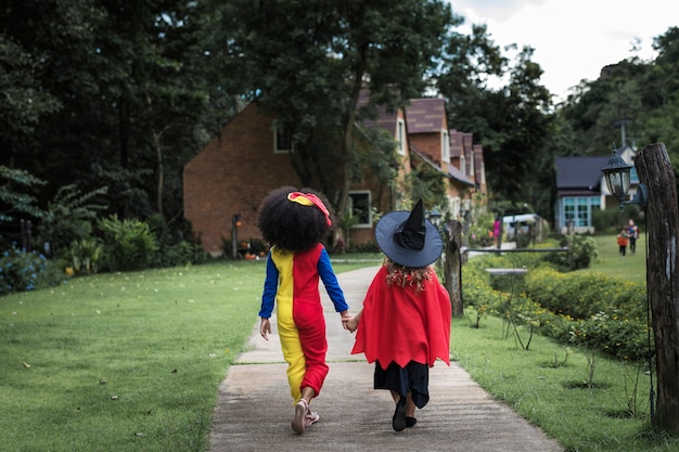 Young girls in Halloween costumes