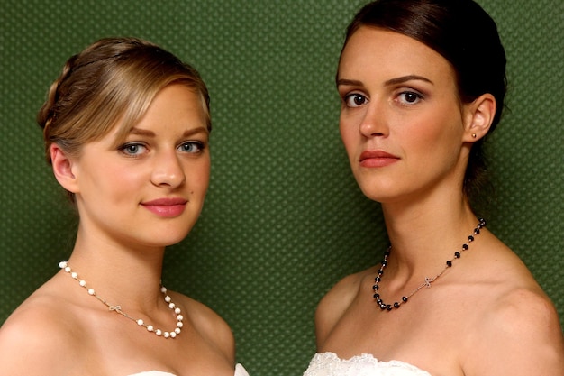 Young girls pose with silver jewelry