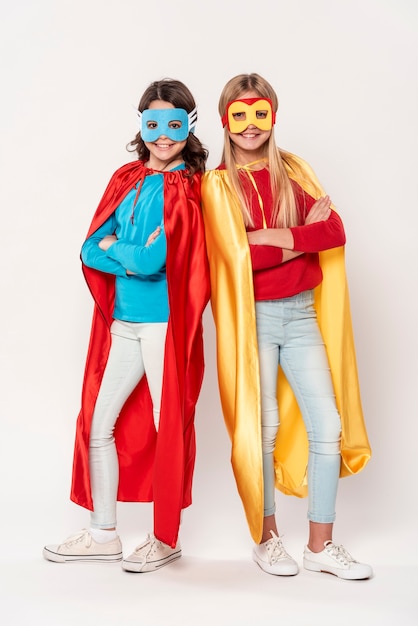 Young girls with hero costumes