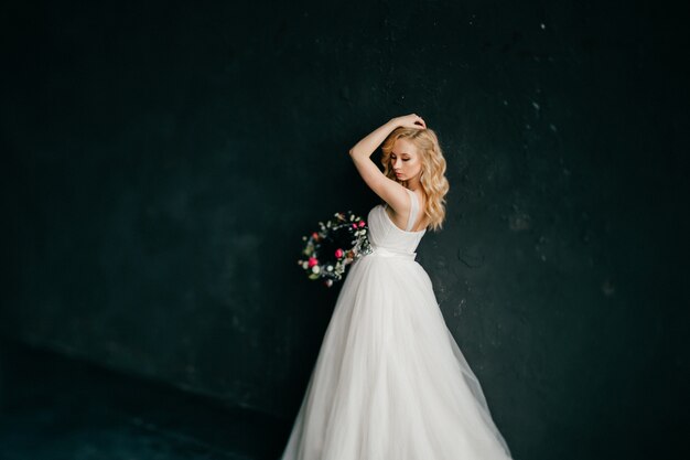 Young glamour bride in wedding dress portrait.