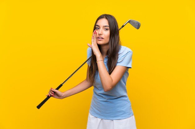 Young golfer woman whispering something