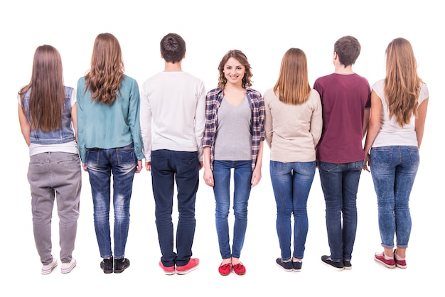 Young group standing with his back