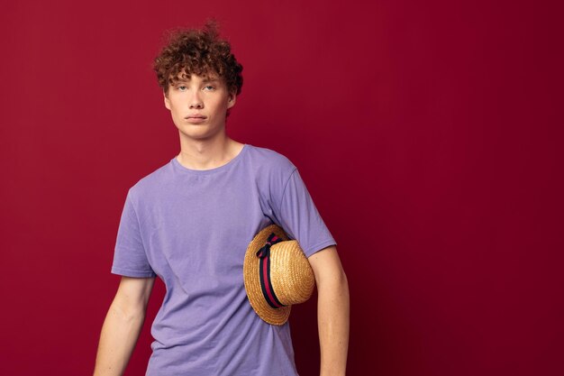 Young guy fashion posing hand gestures stylish hat isolated background unaltered