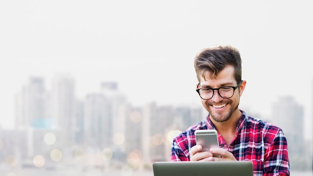 Young guy using his phone