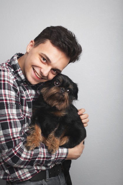 Young guy with his dog.