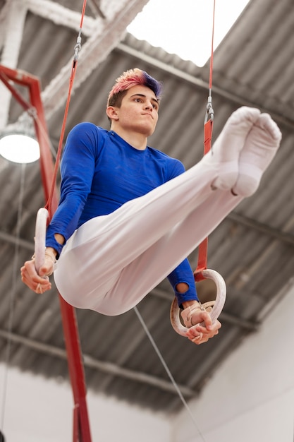 Photo young gymnast training for competition