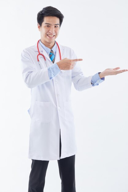 Young handsome Asian doctor in a uniform