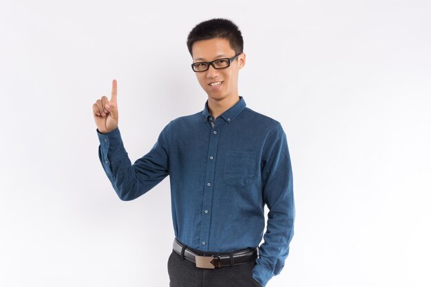 Young handsome asian male in front of white background