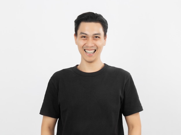 Young handsome asian man smiling with braces and looking at camera