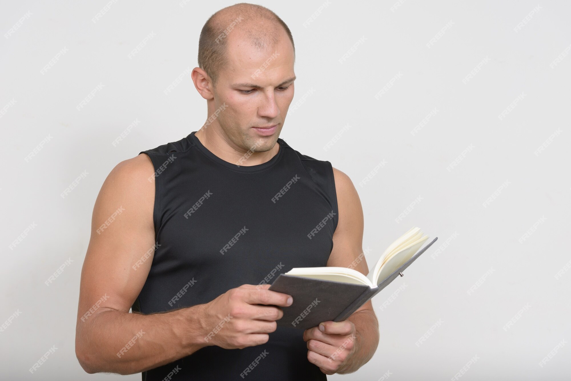 Premium Photo | Young handsome bald man ready for gym against white space Premium Photo | Young handsome bald man ready for gym against white space