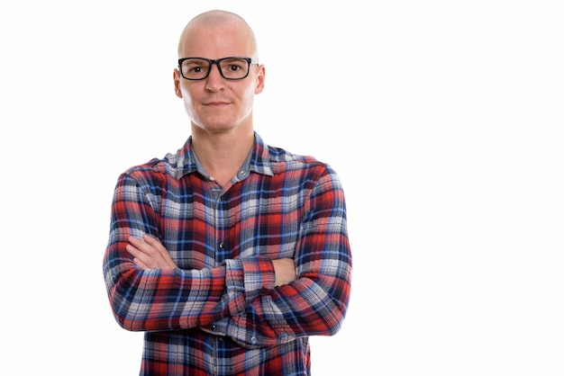 young handsome bald man wearing eyeglasses with arm crossed