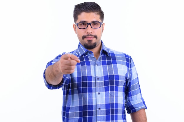 young handsome bearded Iranian hipster man with eyeglasses isolated on white