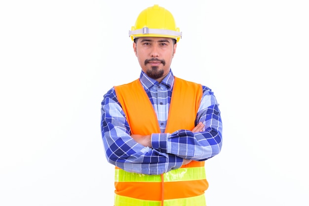 young handsome bearded Iranian man construction worker isolated on white