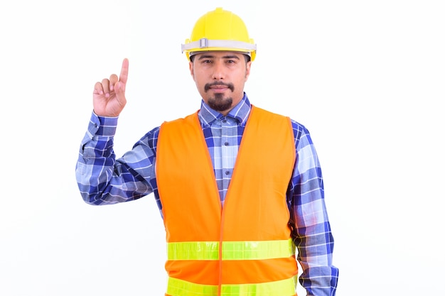 young handsome bearded Iranian man construction worker isolated on white