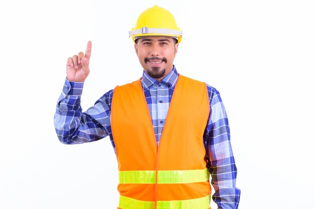 young handsome bearded Iranian man construction worker isolated on white