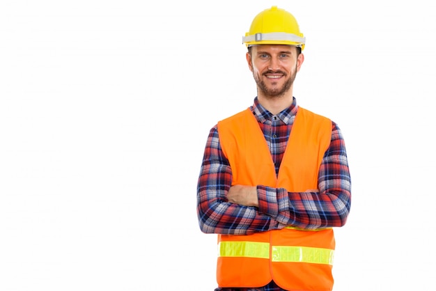 Young handsome bearded man construction worker