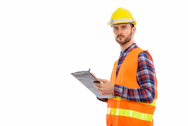 Young handsome bearded man construction worker