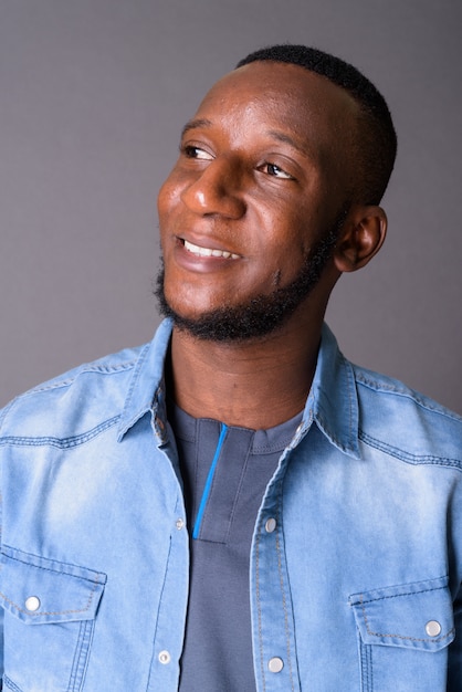 Young handsome bearded man with short hair