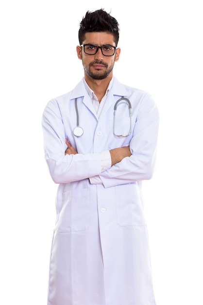 Young handsome bearded Persian man doctor with eyeglasses