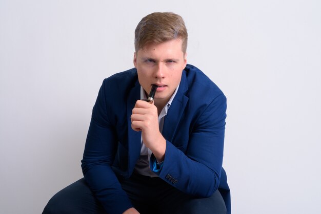 young handsome blonde businessman in suit