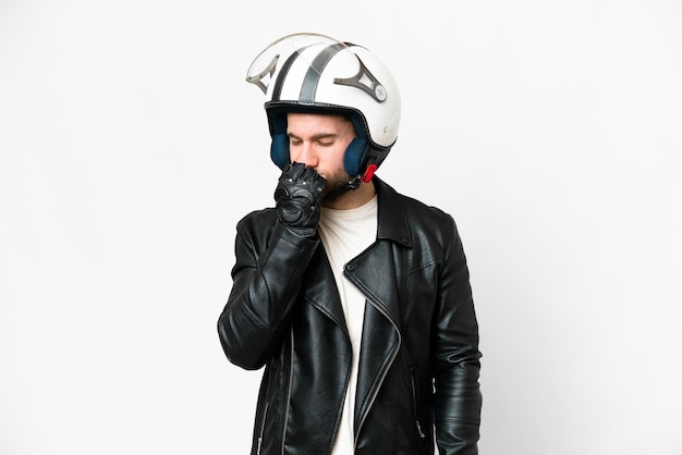 Young handsome blonde man with a motorcycle helmet over isolated white background having doubts