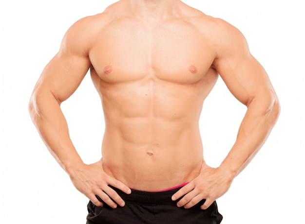 Young handsome bodybuilder man posing with muscular appearance  