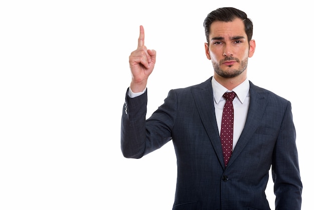 young handsome businessman pointing finger up