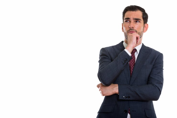 Photo young handsome businessman thinking while looking