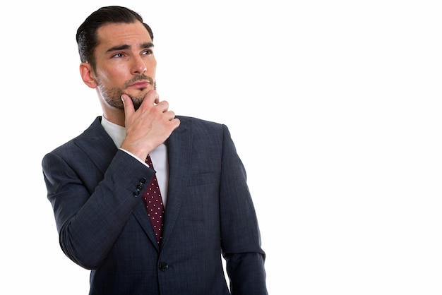 young handsome businessman thinking with hand on chin