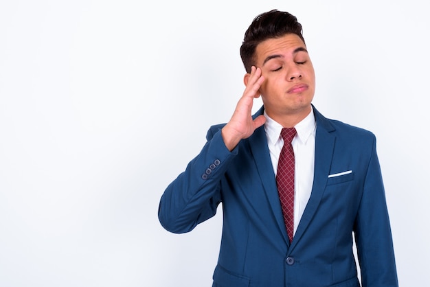 young handsome businessman wearing blue suit on white