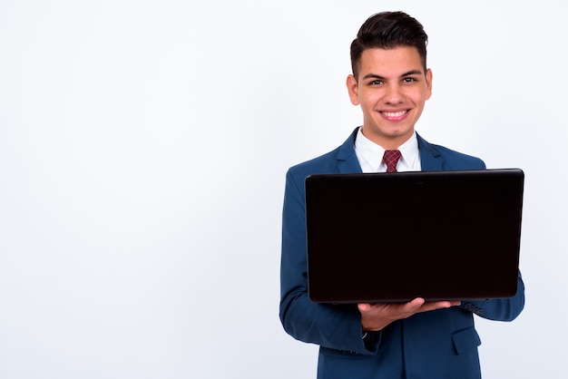 young handsome businessman wearing blue suit on white