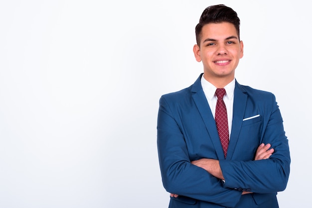 young handsome businessman wearing blue suit on white