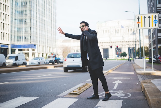 Young handsome caucasian bearded contemporary businessman 