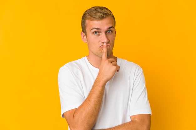 Young handsome caucasian man expressing emotions isolated