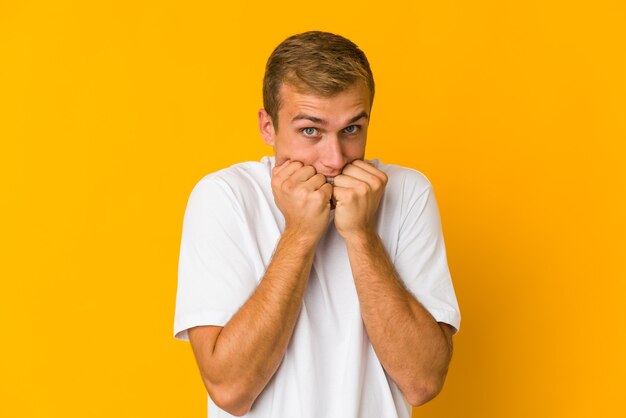 Young handsome caucasian man expressing emotions isolated