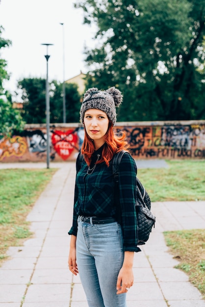 Young handsome caucasian redhead straight hair woman standing still