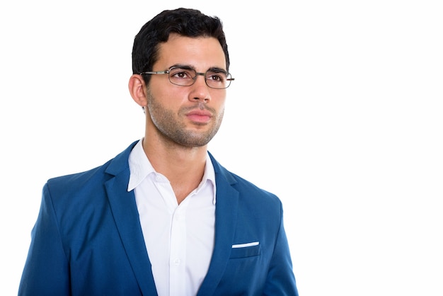 young handsome Hispanic businessman wearing eyeglasses