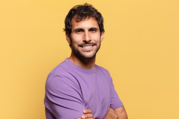 Young handsome indian man. happy and surprised expression