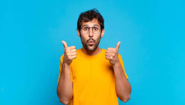 Young handsome indian man with happy expression