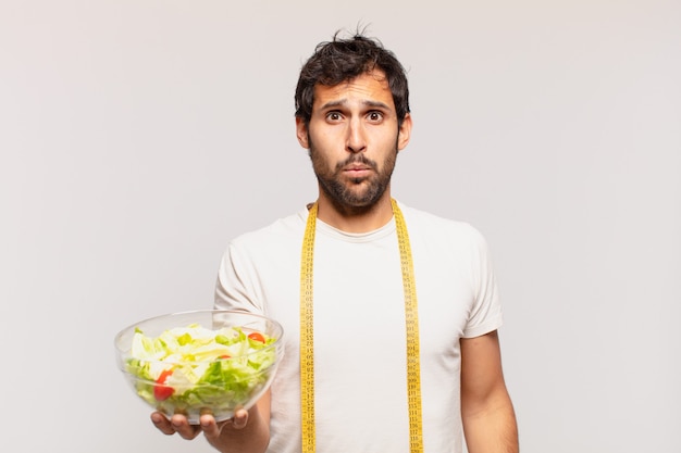 Young handsome indian man with sad expression