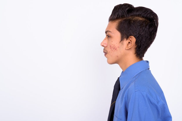 Photo young handsome indian teenage boy as businessman on white