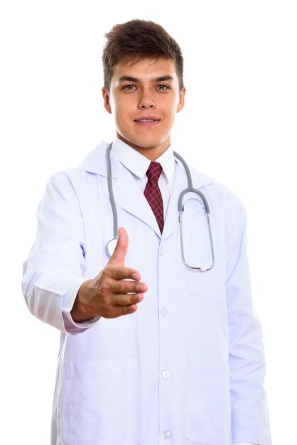 young handsome man doctor giving handshake