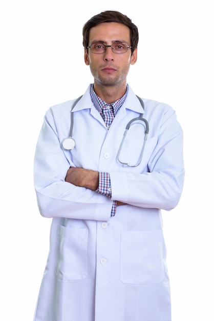 young handsome man doctor wearing eyeglasses with arms crossed