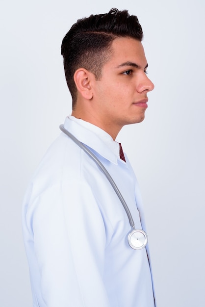 young handsome man doctor on white