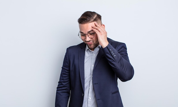 Young handsome man feeling bored, frustrated and sleepy after a tiresome. businessman concept