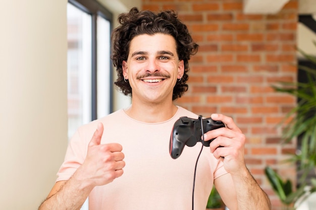 Young handsome man gamer concept at home interior